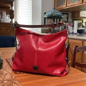 - DOONEY & BOURKE FLORENTINE LEATHER TWIST SAC SHOULDER BAG